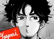 モノクロの漫画風の男性の顔のアップです