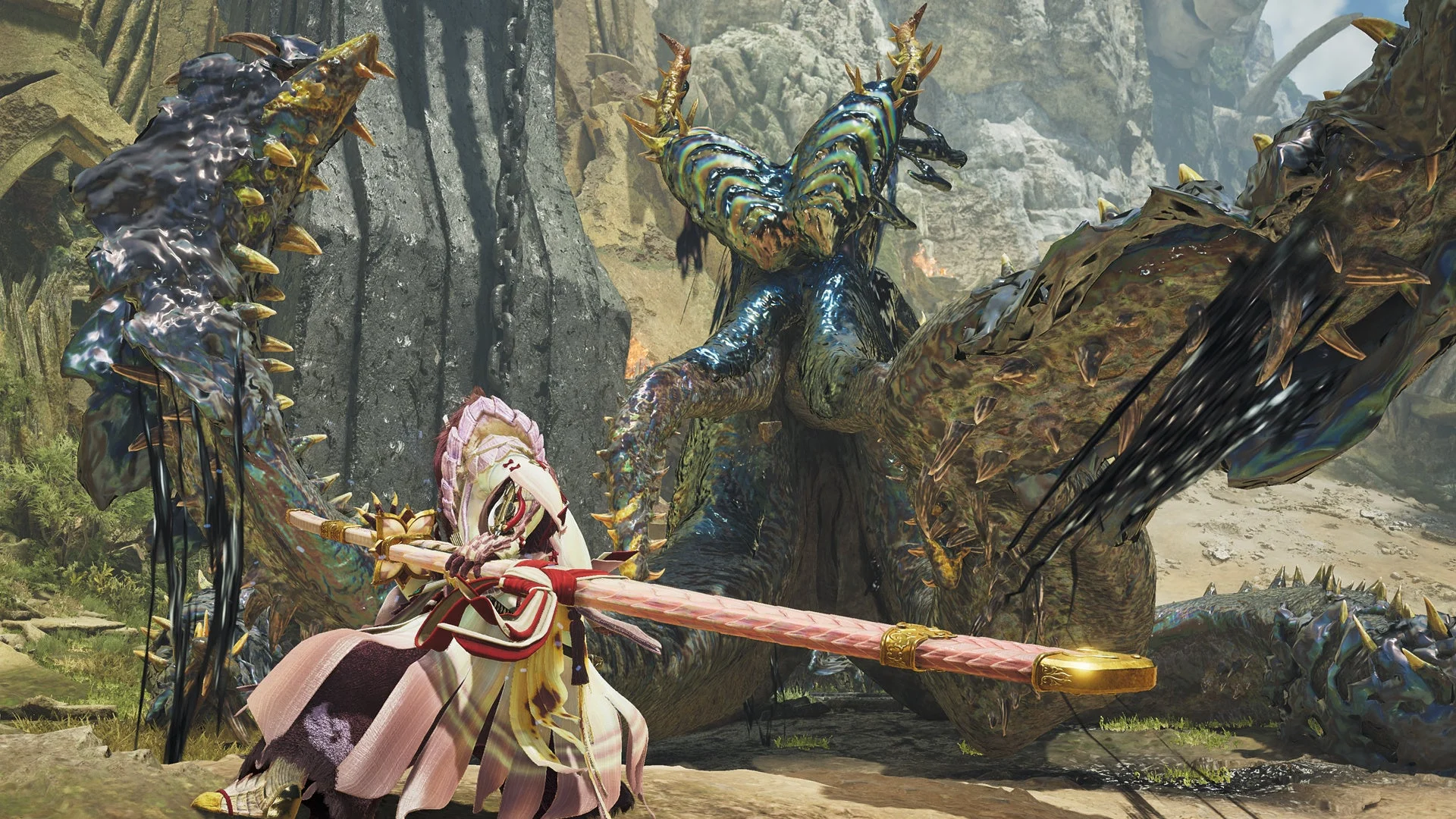 巨大なモンスターと剣を構えたキャラクター