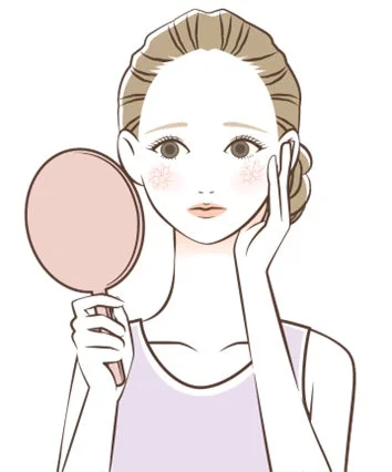 肌の悩みを抱える女性