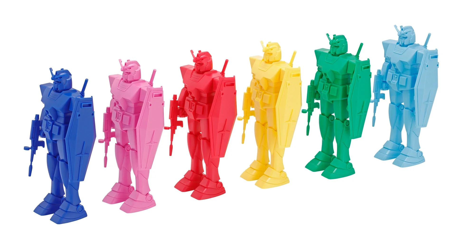 青、ピンク、赤、黄、緑、水色の6体のガンダムタイプのロボットフィギュアが並んでいます