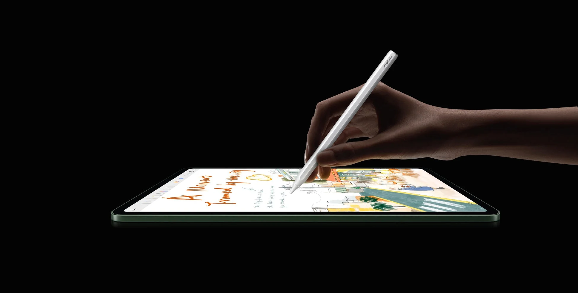 タブレットにスタイラスペンで描く手元