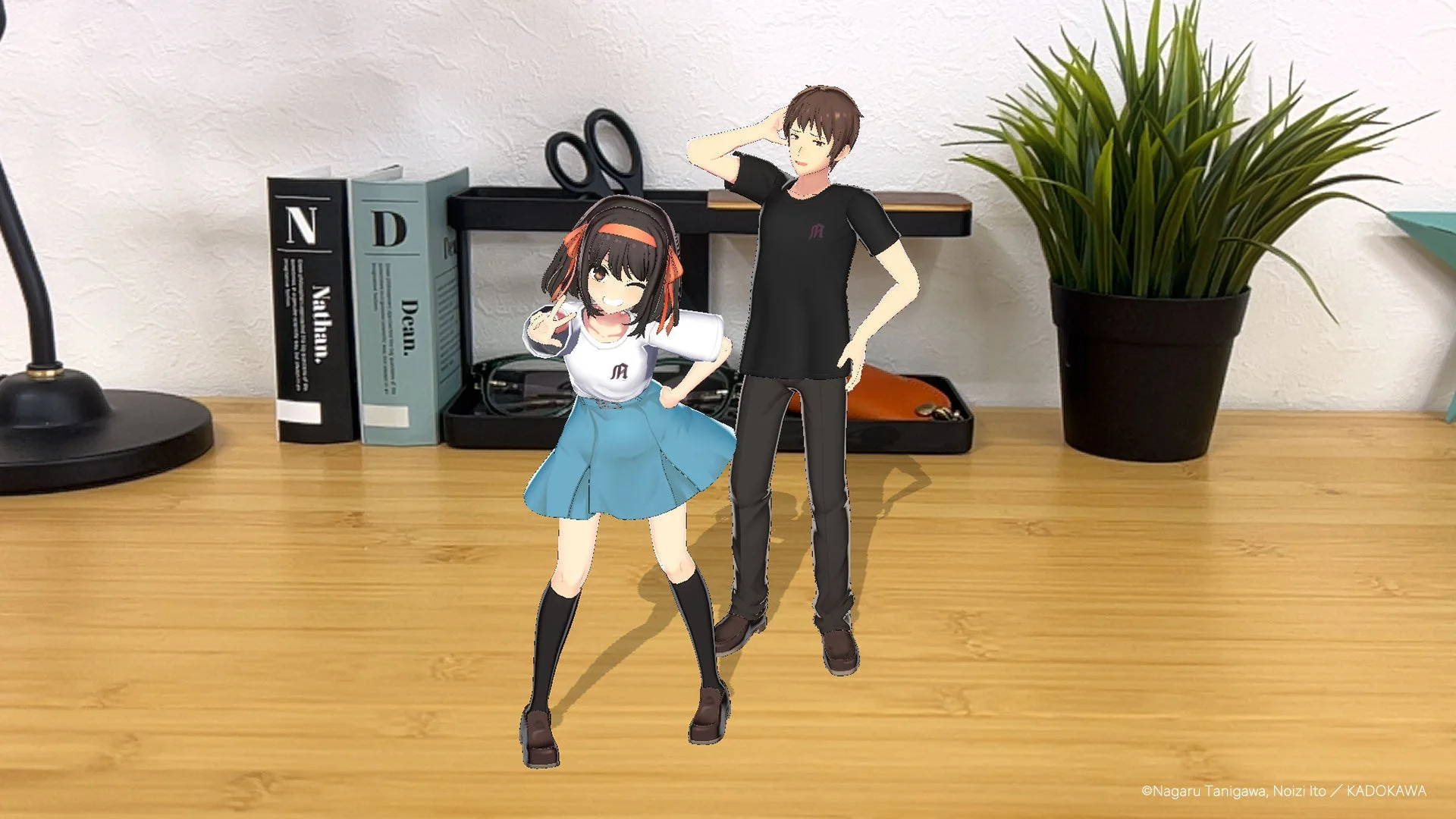 木製のデスクの上に立つ、アニメ風の男女キャラクターの3Dモデル