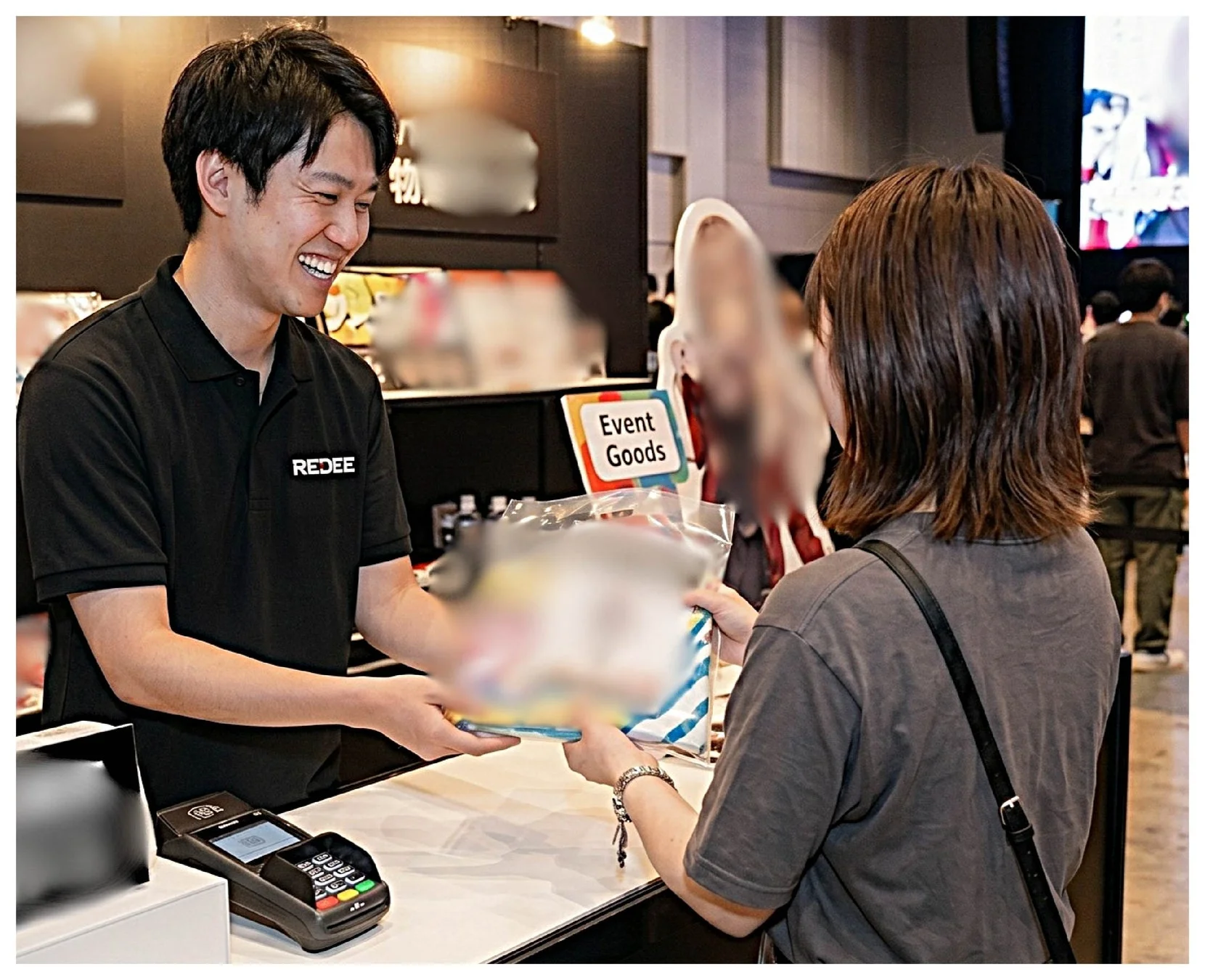 イベント会場でのグッズ販売風景