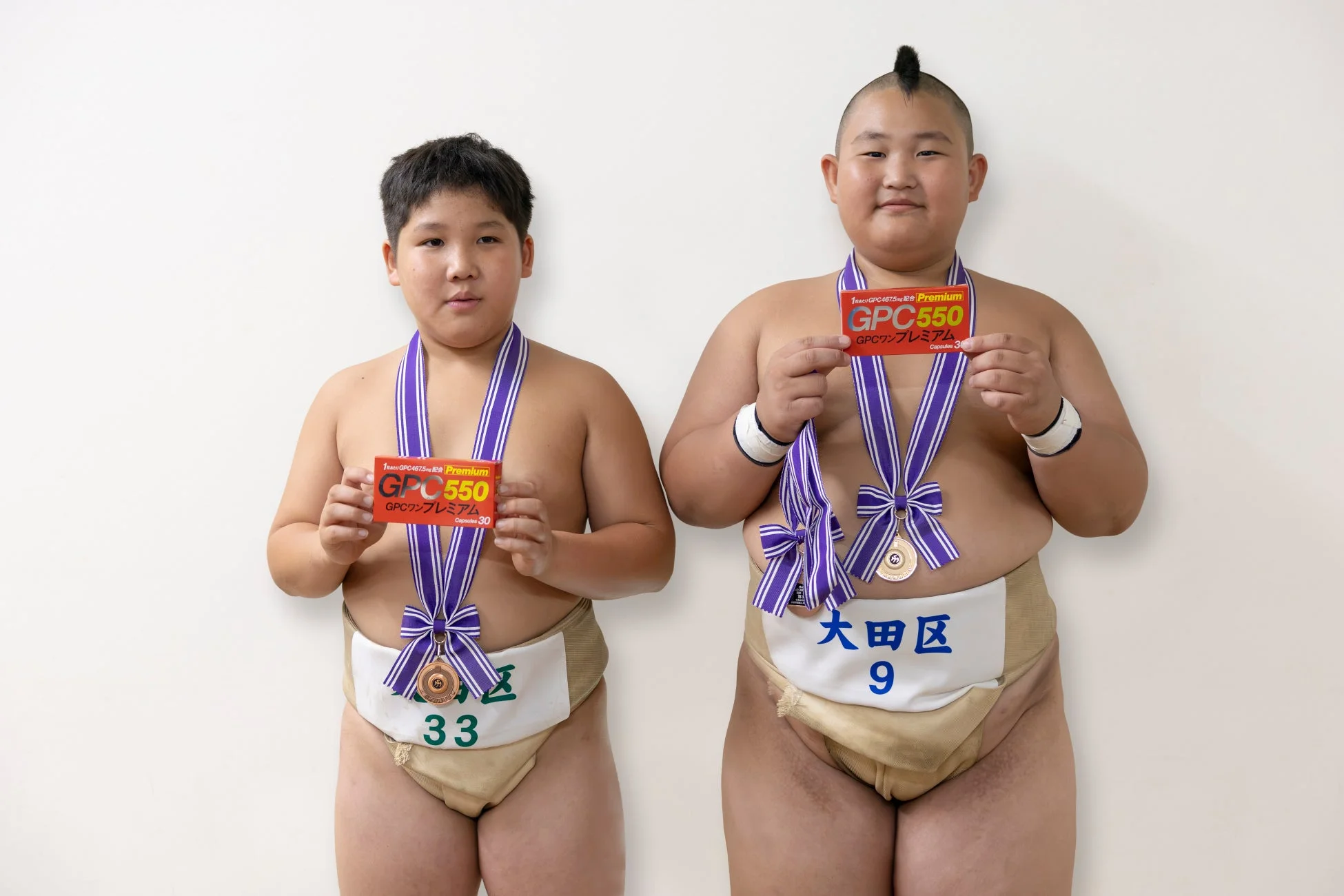 GPCワンを手に笑顔のユウスケくんとショウタロウくん